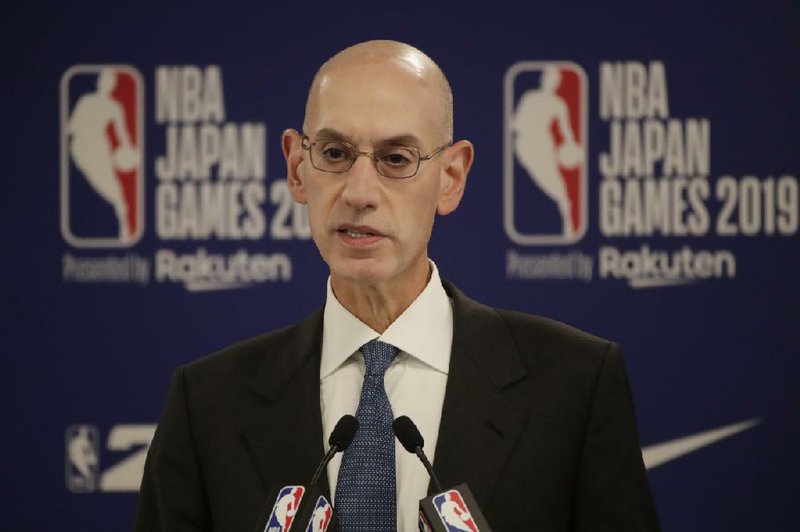 NBA Commissioner Adam Silver speaks at a news conference before an NBA preseason basketball game between the Houston Rockets and the Toronto Raptors Tuesday, Oct. 8, 2019, in Saitama, near Tokyo. 
(AP Photo/Jae C. Hong)