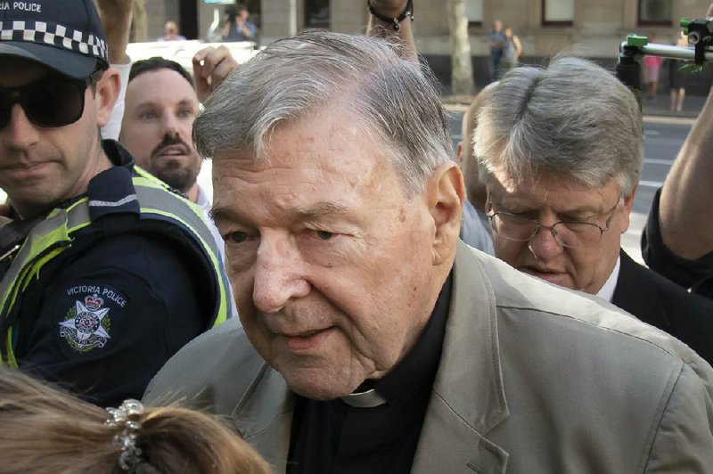 Cardinal George Pell is shown last year as he arrives for a hearing at the County Court in Melbourne, Australia. (AP/Andy Brownbill) 
