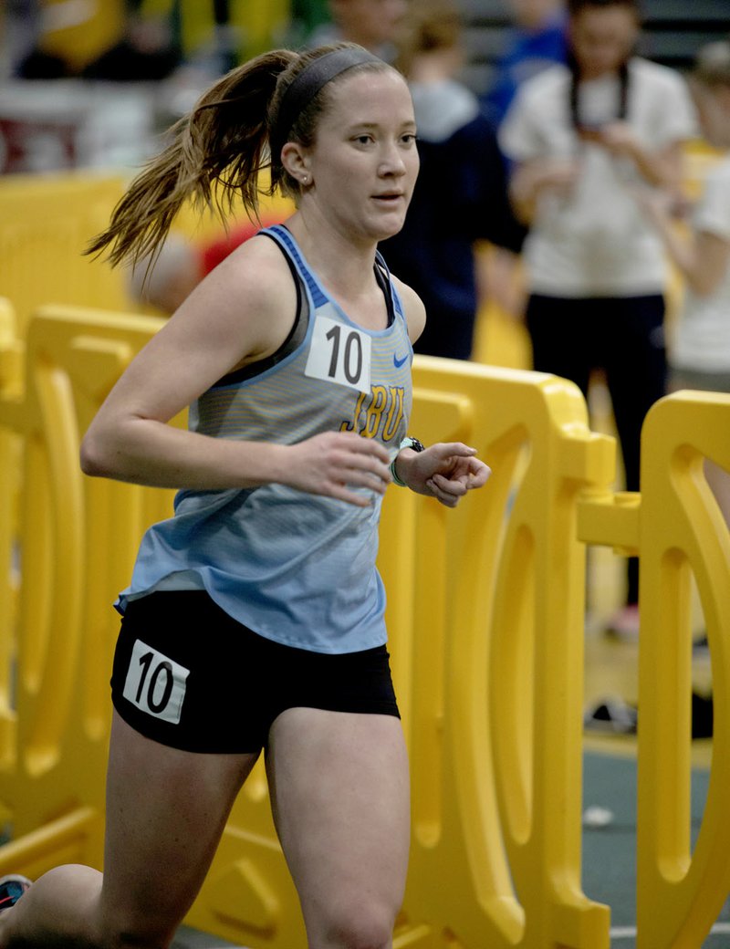 Photo courtesy of JBU Sports Information Junior Sarah Larson runs the indoor 5K at the Missouri Southern State Lion Invite held in Joplin, Mo., in early February.