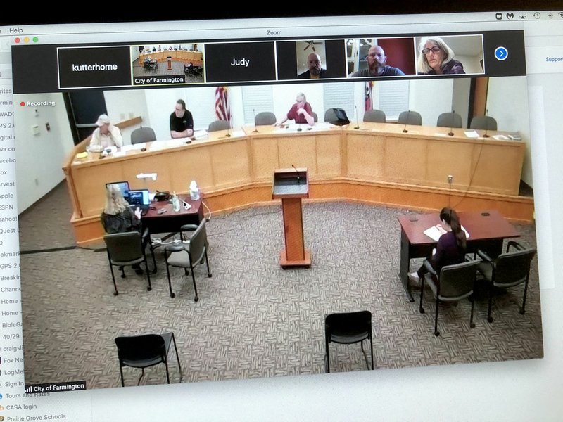 LYNN KUTTER ENTERPRISE-LEADER Farmington Planning Commission held its Monday meeting through the Zoom video platform. Several people were in person at the meeting at City Hall, but most attended the meeting remotely from their homes.