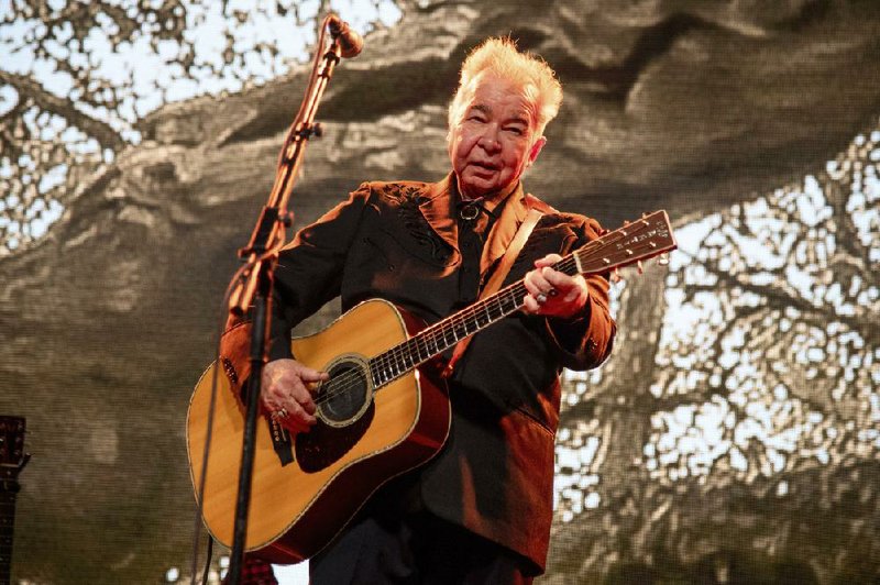 John Prine performs at the Bonnaroo Music and Arts Festival in Manchester, Tenn, in this 2019 photo. Prine died Tuesday from complications of the coronavirus. He was 73.
(Invision/AP file photo/Amy Harris)