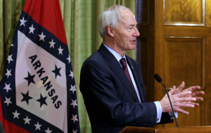 FILE — Gov. Asa Hutchinson answers a question during a press briefing on Wednesday, April 8, 2020, at the state Capitol in Little Rock in this file photo. 