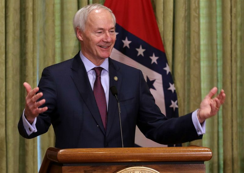 Gov. Asa Hutchinson answers a question during a press briefing on Wednesday, April 8, 2020, at the state Capitol in Little Rock. 
(Arkansas Democrat-Gazette/Thomas Metthe)