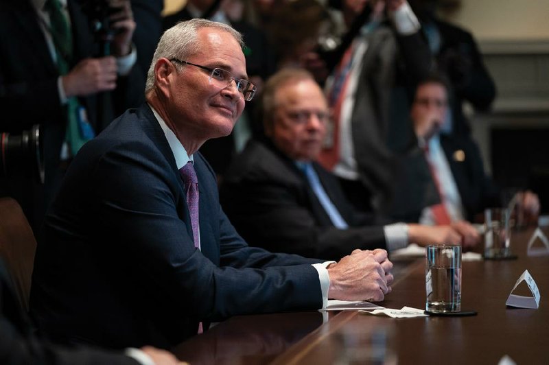 Exxon Mobil CEO Darren Woods, shown last week during a White House meeting of energy-sector leaders, bemoaned the state of oil markets in a conference call Tuesday. “These are definitely challenging times for all of us,” he said.
(AP/Evan Vucci)