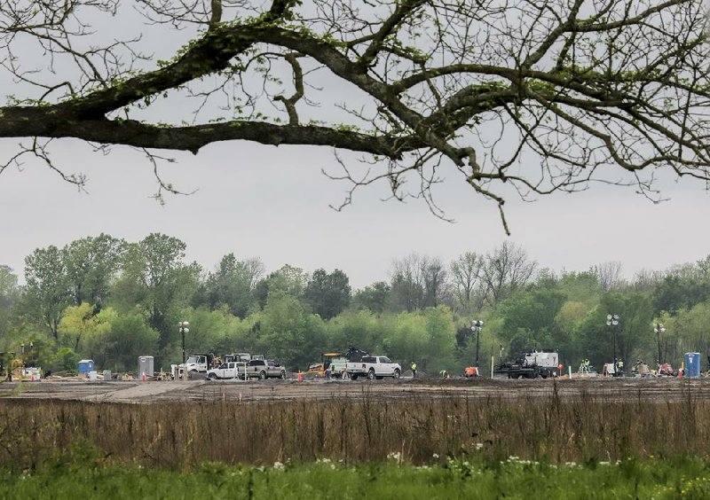 In this file photo construction is underway on an Amazon facility on land at the Port of Little Rock. While details about the project are kept under wraps for now, officials say the economic opportunity for the city is unprecedented. (Arkansas Democrat-Gazette/John Sykes Jr.) 