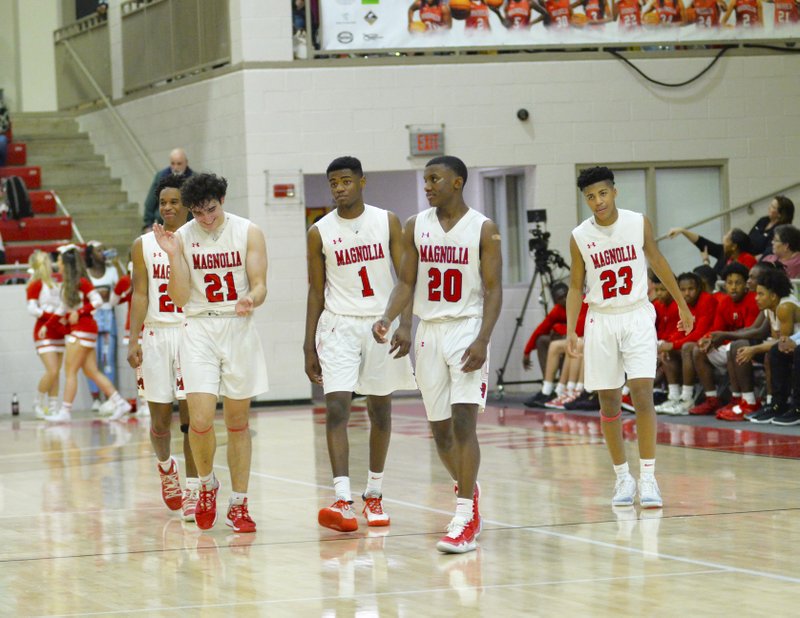 Magnolia's starting five of Braelyn Beasley (22), Kyle Carver (21), Devonte Walker (1), Derrien Ford (20), and Colby Garland (23) take the floor against Hamburg in the Panthers' home finale on Feb. 18, 2020. The undefeated team faces Warren on the road Friday to close out the regular season.  