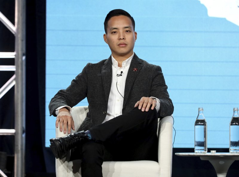 FILE - This Jan. 19, 2020 file photo shows Alan Yang during the Apple+ TCA 2020 Winter Press Tour in Pasadena, Calif. Yang makes his feature directorial debut with &quot;Tigertail,&quot; on Netflix Friday, which is loosely based on his father's immigration story. (Photo by Willy Sanjuan/Invision/AP, File)