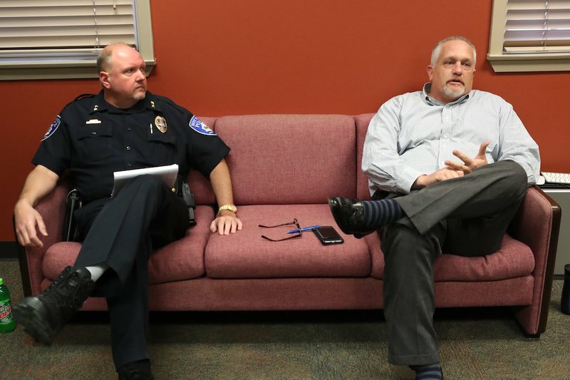 Hot Springs Police Chief Jason Stachey, left, listens as Assistant Chief Walt Everton discusses the city's homicide rate in this file photo. - File photo by The Sentinel-Record