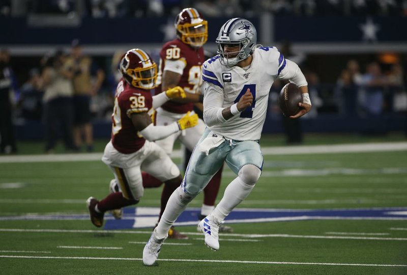Dallas Cowboys quarterback Dak Prescott (4) is trying to negotiate a new contract but might nd whatever leverage he had in negotiations slipping away this offseason. (AP/Ron Jenkins) 
