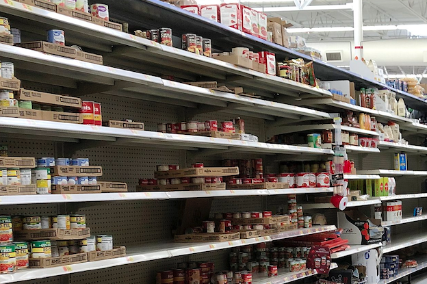 FILE PHOTO — Shelves inside a Walmart store.