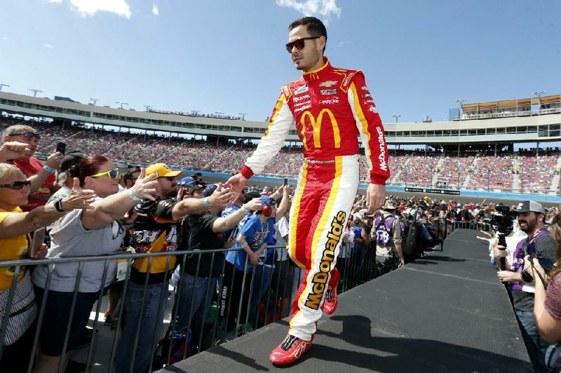 The firing of Kyle Larson, seen here before a March race at Phoenix Raceway, is part of a drama-filled month since NASCAR pivoted from real racing to iRacing.
(AP/Ralph Freso)