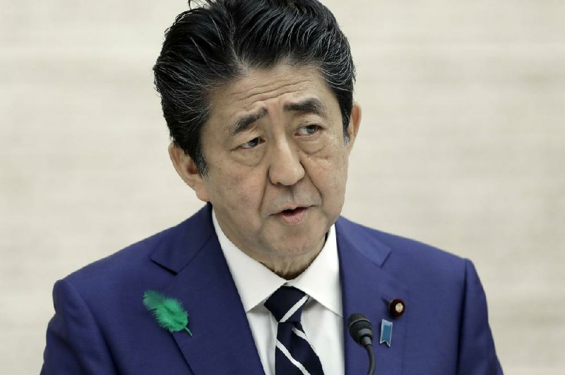 Speaking Friday in Tokyo about government handouts during the pandemic, Japanese Prime Minister Shinzo Abe apologized for the confusion caused by his reversal on the matter.
(AP/Kiyoshi Ota)