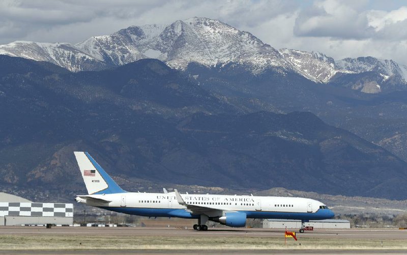 With Pike’s Peak in the background, Air Force Two taxis to the terminal Saturday at Peterson Air Force Base as Vice President Mike Pence arrives in Colorado Springs, Colo. Video at arkansasonline.com/419pence/
(AP/David Zalubowski)