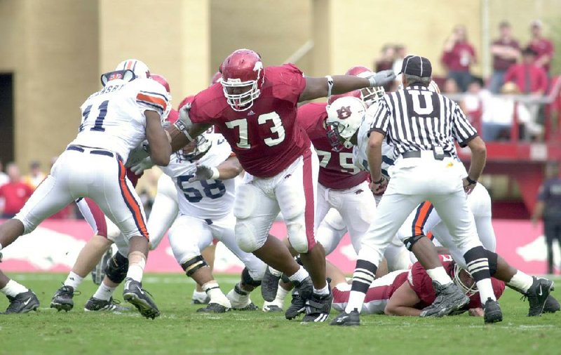 Shawn Andrews (73), here playing against Auburn in 2003, became a two-time consensus All-America tackle for Arkansas and is ranked No. 7 on the Arkansas Democrat-Gazette’s countdown of top pro Razorbacks. (NWA Democrat-Gazette/Andy Shupe) 