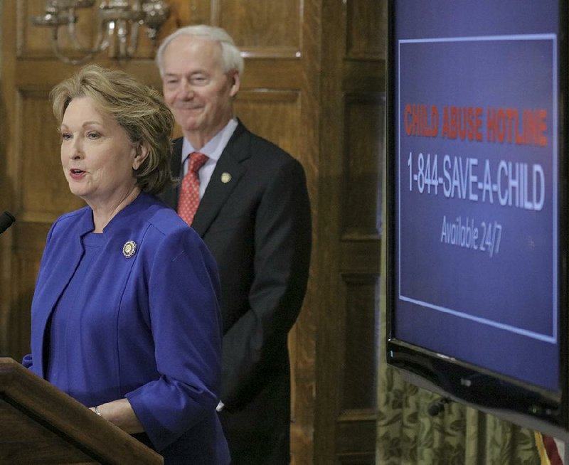 Arkansas first lady Susan Hutchinson talks about child abuse Monday during the governor’s news conference at the state Capitol in Little Rock. “With or without a virus, maltreatment of our children, our precious children and teens, does go on,” she said. (Arkansas Democrat-Gazette/John Sykes Jr.)