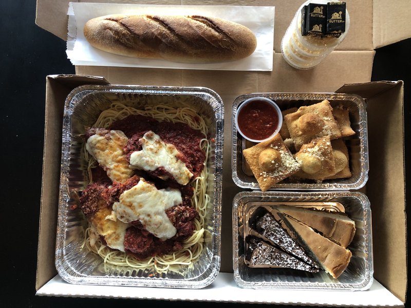 Family Meal No. 3 from Bruno's Little Italy features chicken or veal parmigiana, toasted ravioli, bread and dessert for four.

(Special to the Democrat-Gazette)