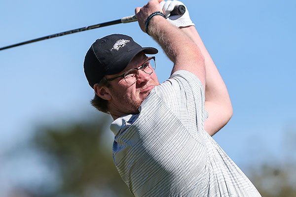 Arkansas golfer William Buhl tees off on the first hole during the first round of an NCAA golf tournament on Monday, Feb. 3, 2020 in Ponte Vedra, Fla. (AP Photo/Gary McCullough)