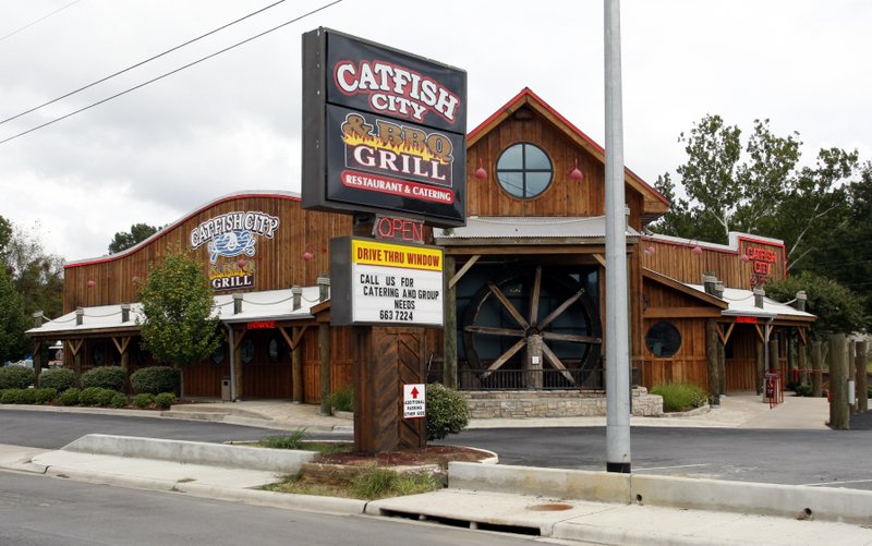 Catfish City & BBQ Grill, seen in this 2008 photo, will be closing in the next couple of weeks after the landlord sold the building it has occupied for more than 36 years.
(Democrat-Gazette file photo)