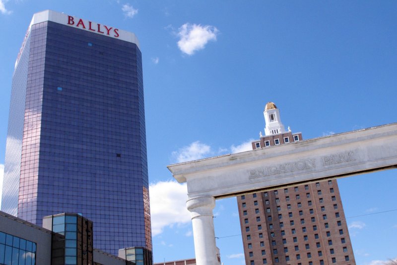 This April 24, 2015 photo shows the exterior of Bally's casino in Atlantic City, N.J. Caesars Entertainment and VICI Properties announced, Friday, April 24, 2020, they are selling Bally's to Rhode Island-based Twin River Worldwide Holdings for $25 million. (AP Photo/Wayne Parry)