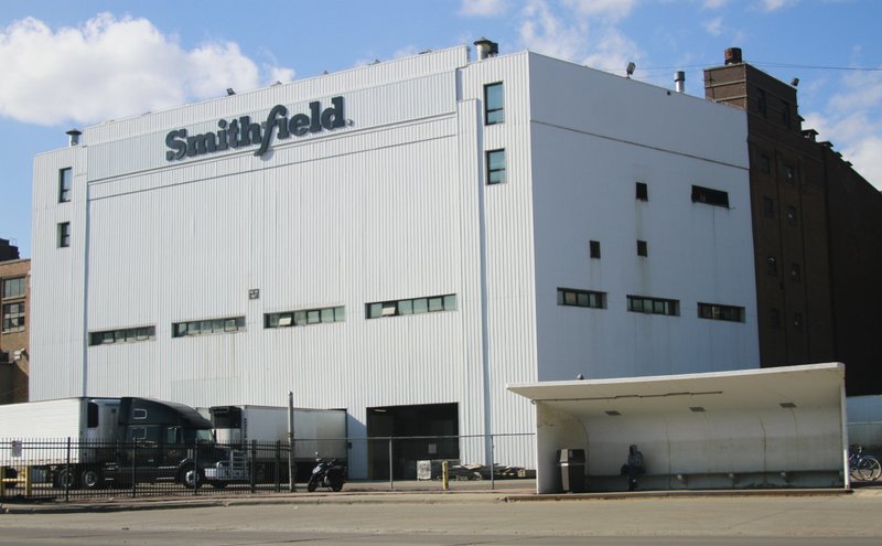 This April 8, 2020, file photo shows the Smithfield pork processing plant in Sioux Falls, S.D., where health officials reported dozens employees have confirmed cases of the coronavirus infection. Meat isn't going to disappear from supermarket shelves because of outbreaks of the coronavirus among workers at massive slaughterhouses, but there could be less selection and higher prices as plants struggle to stay open. Smithfield Foods has halted work at the plant, as of Monday, April 27, 2020. 