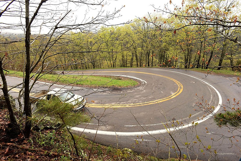 A picturesque stretch of Arkansas 103 between Oark and Clarksville, seen here on April 3 2020, features some serious switchbacks. Several miles of the highway through the Ozark National Forest and the Arkansas River valley make for a fun and scenic road trip. (NWA Democrat-Gazette/Flip Putthoff) story.lead_photo.caption