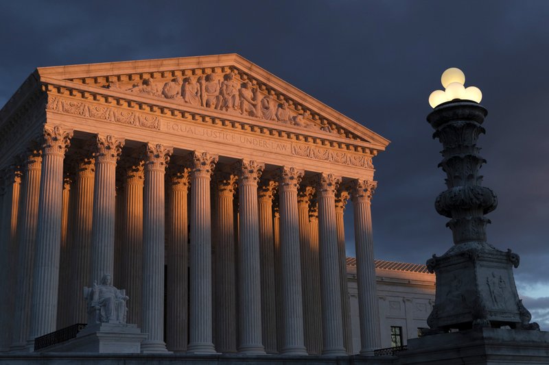 After the Supreme Court’s decision Monday, Second Amendment activists still await the court’s action on cases involving the right to carry arms outside the home, and restrictions on the kinds of weapons that can be sold and possessed. (AP Photo/J. Scott Applewhite)