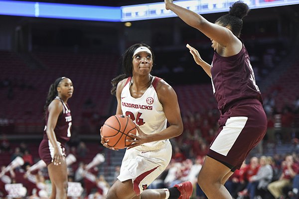 Arkansas' Taylah Thomas (24) looks to shoot during a game against Texas A&M on Thursday, Jan. 2, 2020, in Fayetteville. 