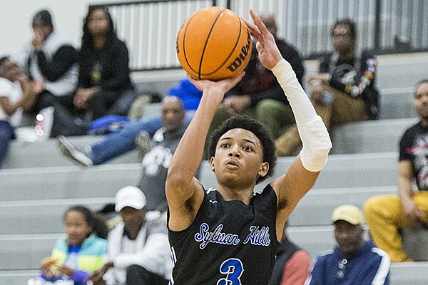 Sylvan Hills guard Nick Smith shoots a 3-pointer during a game against Little Rock Hall on Friday, Jan. 17, 2020, at Cirks Arena in Little Rock. 