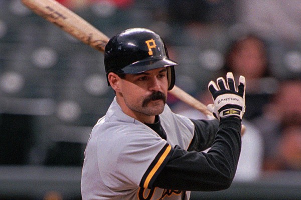 Pittsburgh Pirates batter Jeff King connects for a single in the first inning at Denver's Coors Field Friday, Aug. 23, 1996. (AP Photo/David Zalubowski)