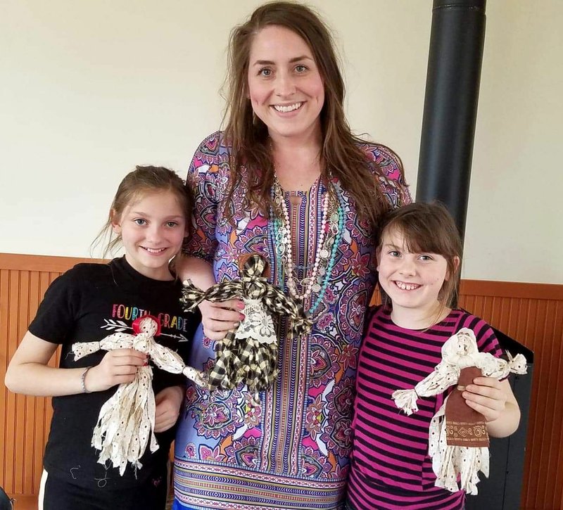 Courtesy photo Bylie Abernathy, her mother Ashley, and her sister Naomi Abernathy show off the rag dolls they created in preparation for the Heritage Festival at the New Bethel School, just west of Anderson. The rag dolls will be among the hand-created merchandise sold at the "General Store." The festival was originally set for May but has been rescheduled for this fall.