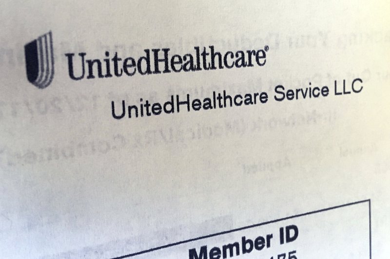 FILE - In this June 15, 2018 file photo, United Healthcare correspondence is seen in North Andover, Mass. The pandemic has shut down large portions of the economy and forced many companies to abandon their forecasts in 2020. The nation's largest health insurance provider, UnitedHealth Group Inc., and Medicaid specialist Centene Corp. have reaffirmed their forecasts earlier this month. (AP Photo/Elise Amendola, File)