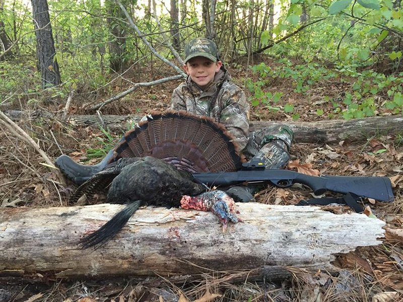 An Arkansas Game and Fish Commission photo shows a hunter during turkey season. 