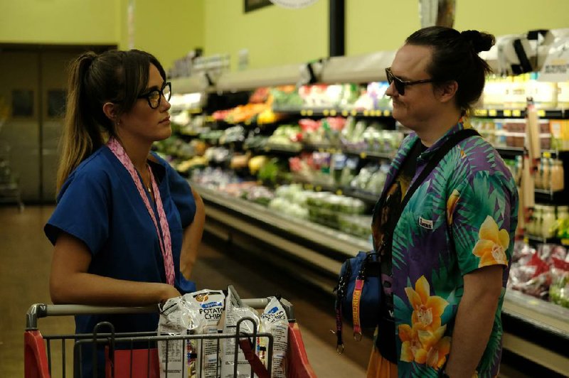 Local girl Johnna (Eden Brolin) meets the indefatigable and overconfident Swin (Clark Duke) in a Piggly Wiggly in Duke’s feature directorial debut Arkansas (most of which was shot in Alabama).