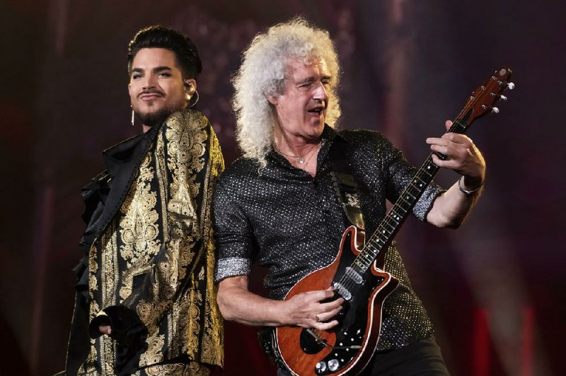 FILE - In this Sept. 28, 2019 file photo, Adam Lambert, left, and Brian May, of Queen, perform at the Global Citizen Festival in New York. Lambert and May, along with bandmate Roger Taylor, recently gathered virtually to record a new version of the Queen classic, "We Are the Champions."
(Photo by Charles Sykes/Invision/AP, File)