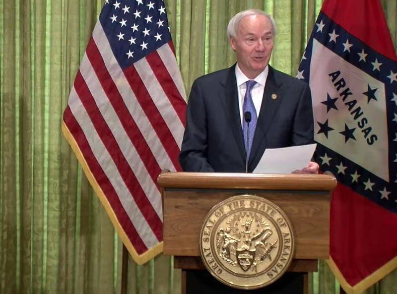 Arkansas Gov. Asa Hutchinson speaks to reporters at a briefing in Little Rock on Monday in this screen grab of video provided by the governor's office. 