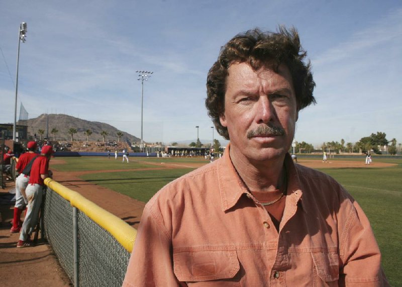 In this Feb. 3, 2006, photo, former Oakland Athletics pitcher Matt Keough attends his son's baseball game at at William R. Morse Stadium in Henderson, Nev. Keough, the former A's pitcher and special assistant, has died. He was 64. The Athletics announced the death Saturday night, May 2, 2020, without providing details. Keough was an American League All-Star as a rookie in 1978 and was selected AL Comeback Player of the Year in 1980. Ronda Churchill/San Francisco Chronicle via AP)