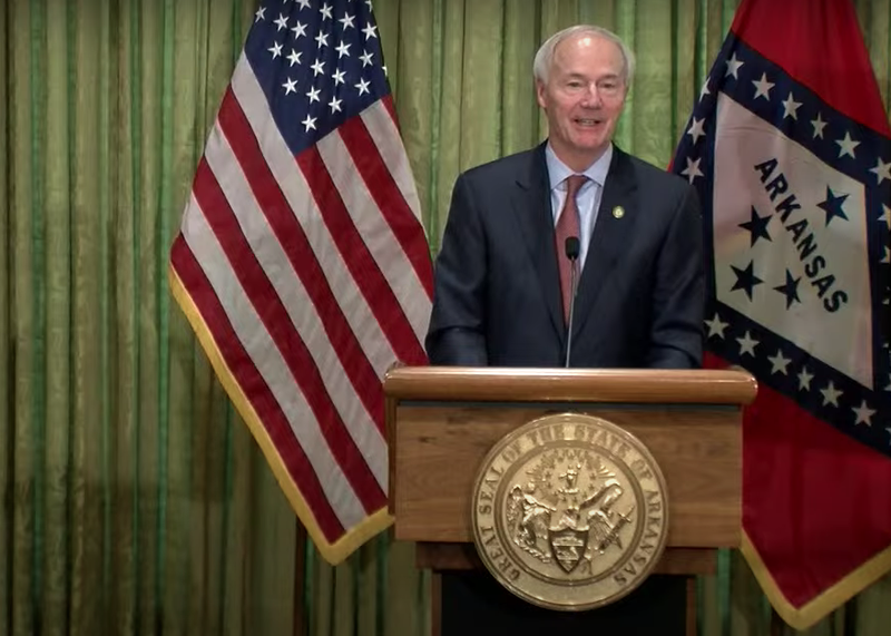 Arkansas Gov. Asa Hutchinson speaks to reporters at a Wednesday briefing in Little Rock in this screen grab of video provided by the governor's office. 