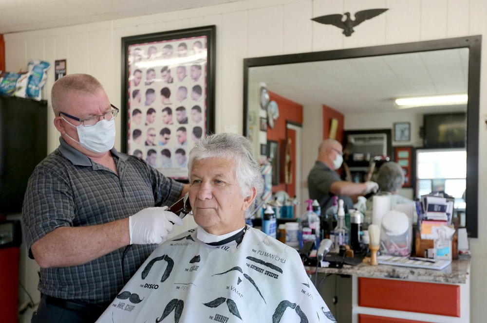 Barbers and hair salons booked solid on opening day