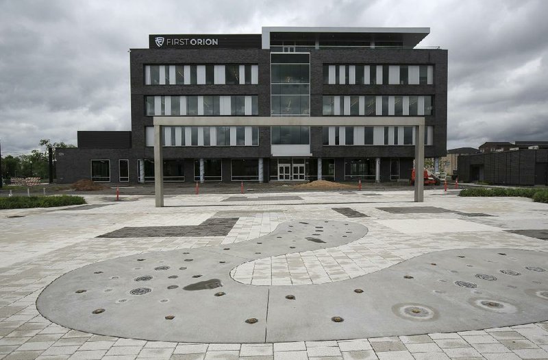 First Orion employees are starting to move into the company’s new building in downtown North Little Rock. The 75,000-square-foot facility is at Argenta Plaza on Main Street.
(Arkansas Democrat-Gazette/Staton Breidenthal)