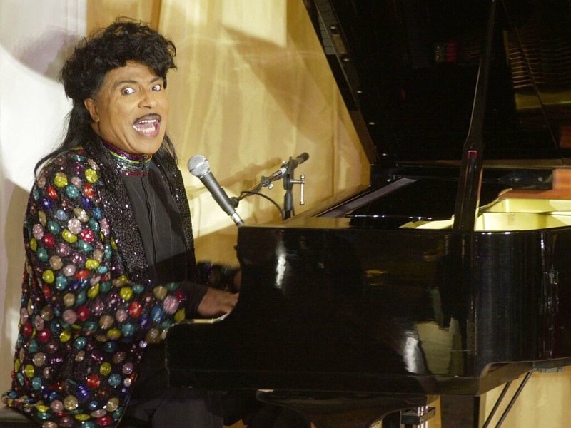 In this July 22, 2001 file photo, Little Richard performs at the 93rd birthday and 88th year in show business gala celebration for Milton Berle, in Beverly Hills, Calif. Little Richard, the self-proclaimed “architect of rock ‘n’ roll” whose piercing wail, pounding piano and towering pompadour irrevocably altered popular music while introducing black R&B to white America, has died Saturday, May 9, 2020. (AP Photo/John Hayes, File)