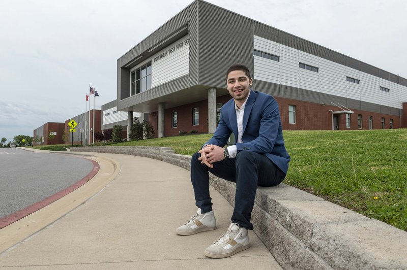 Mohamad Alkhatib is a senior at Bentonville West High School in Centerton. He and his family fled to the United States to escape war in his native Syria. "School wasn't really the goal. It was just trying to live 'til the next day. It was that bad," he said of Syria. (NWA Democrat-Gazette/Spencer Tirey)