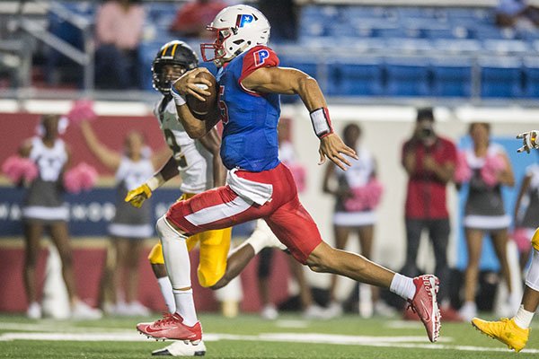 Little Rock Parkview quarterback Landon Rogers (15) runs for a touchdown during a game against Watson Chapel on Thursday, Oct. 10, 2019, at War Memorial Stadium in Little Rock. 