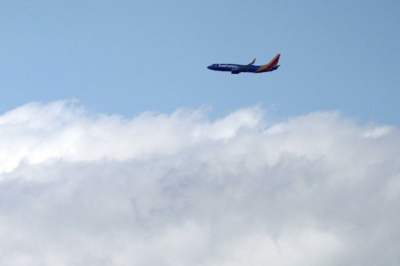 A Southwest Airlines jet makes its approach to St. Louis Lambert International Airport on Friday. (AP/Jeff Roberson) 