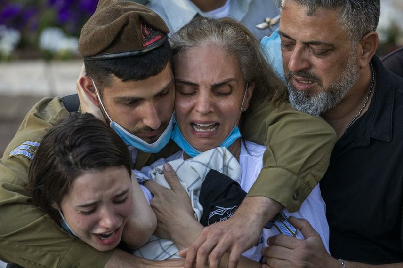 The mother of Israeli Staff Sgt. Amit Ben-Yigal grieves Tuesday during the soldier’s funeral in Beer Yaakov. (AP/Ariel Schalit) 
