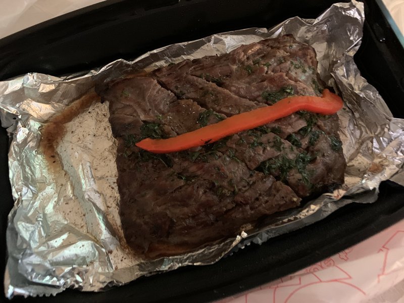 A strip of red bell pepper garnishes the flank steak from Buenos Aires Grill and Cafe in the River Market.
(Arkansas Democrat-Gazette/Eric E. Harrison)