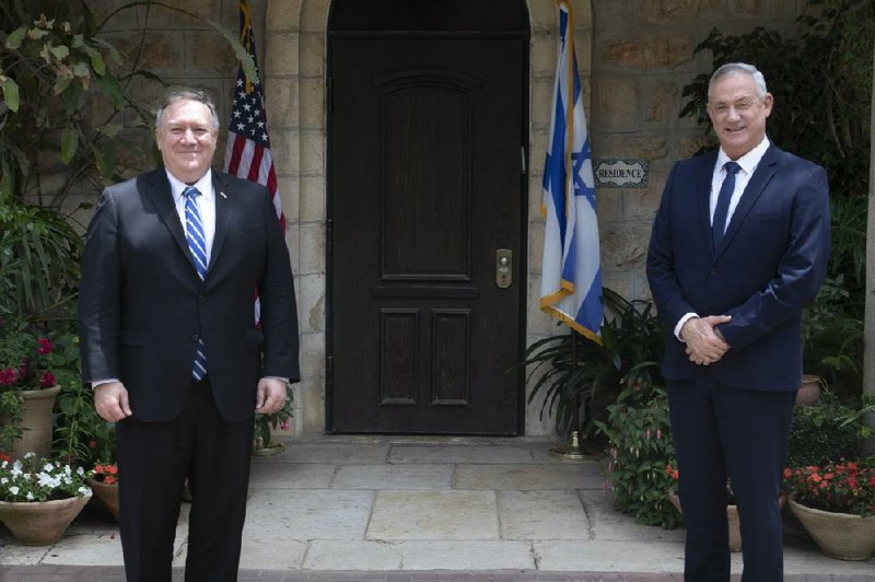 U.S. Secretary of State Mike Pompeo (left) meets Israeli Blue and White party leader Benny Gantz on Wednesday in Jerusalem.
(AP/Sebastian Scheiner)