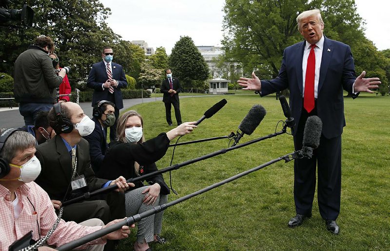 President Donald Trump speaks Thursday outside the White House before heading to Allentown, Pa. A recording of a 2018 dinner appears to contradict Trump’s statements that he did not know indicted businessmen Lev Parnas or Igor Fruman, and he can be heard saying “get rid” of U.S. Ambassador to Ukraine Marie Yovanovitch.
(AP/Alex Brandon)