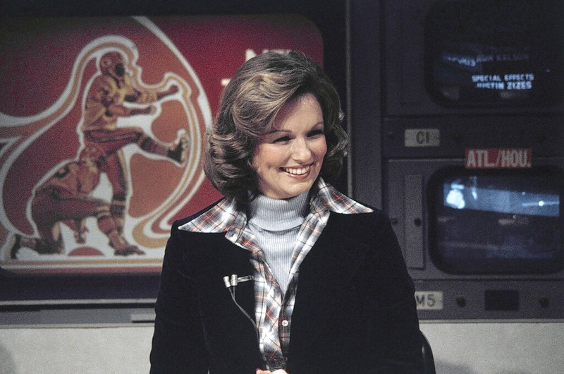 Phyllis George is seen in CBS Studios in New York in this Nov. 28, 1976, file photo. George, the former Miss America who became a female sportscasting pioneer on CBS's “The NFL Today” and served as the first lady of Kentucky, has died. She was 70.