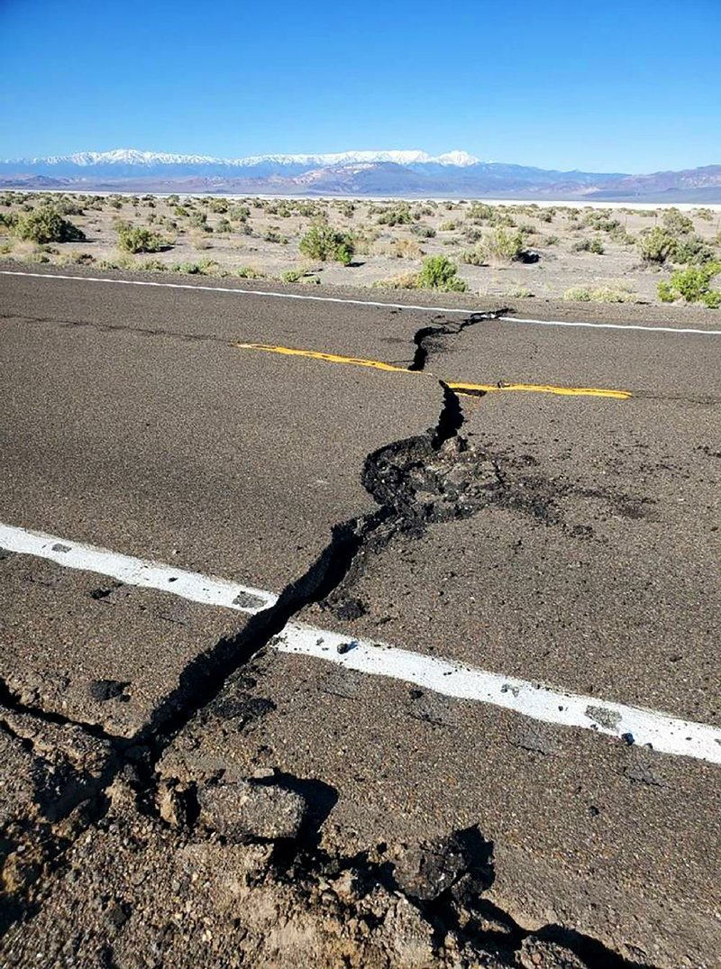 U.S. Highway 95 bears the marks of the damage done by a 6.5-magnitude quake that struck western Nevada early Friday.
(AP/Nevada Highway Patrol)