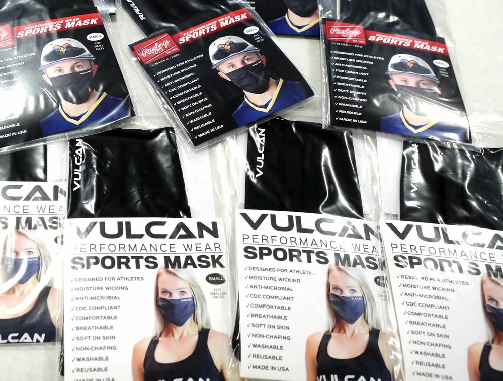 Some of the Vulcan Sporting Goods Co. "performance wear sports masks" on display at the company's headquarters at 736 Mid-America Blvd. - Photo by Richard Rasmussen of The Sentinel-Record